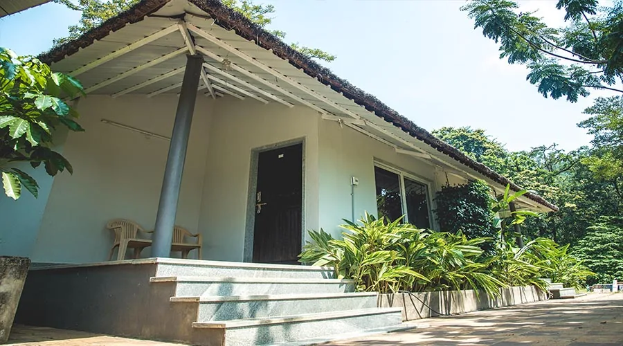 Cottage stay exterior at Whistling Woods Dandeli