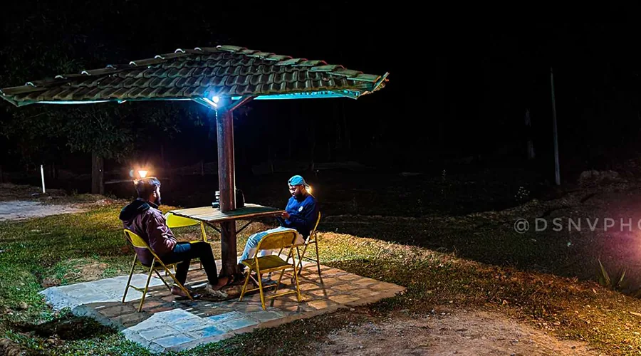 Night sit-out under a tiled gazebo at Hidden Valley Dandeli