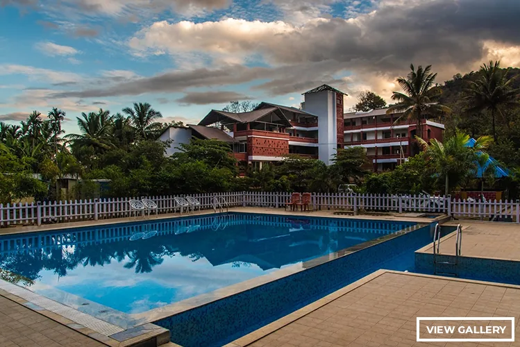 Swimming pool at Jungle Bell River Resort Dandeli