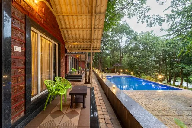 Pool-view sit-out at a Rain Forest Dandeli cottage