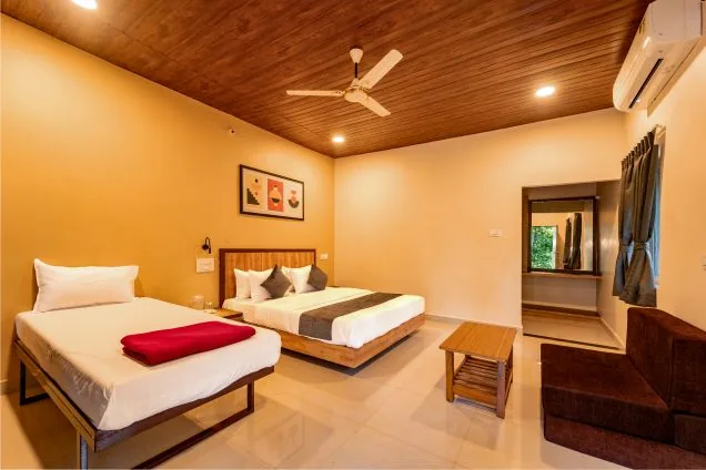 AC cottage bedroom at Rain Forest Dandeli