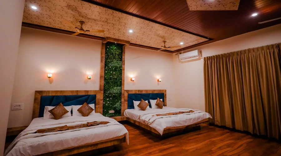 AC family bedroom with twin beds at Woodpecker Homestay Dandeli
